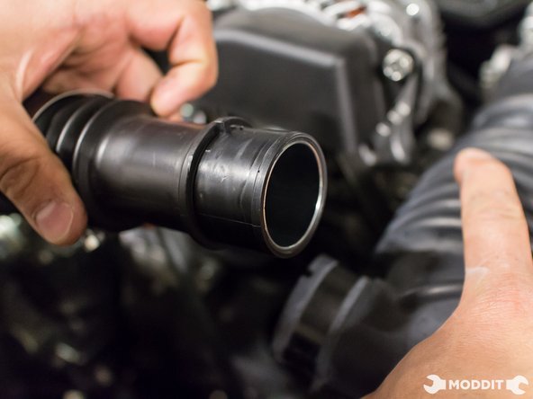 Carefully remove the stock intake tube from intake pipe and throttle body.