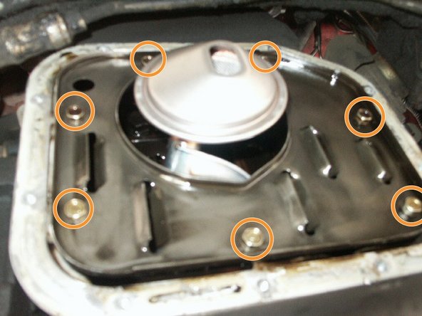 Install shield back in place and tighten down 7 bolts using 10mm socket.