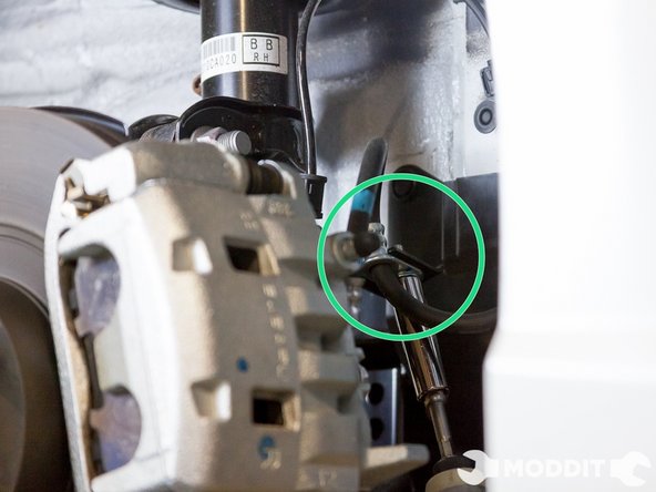 First you have to remove the brake line brackets with a 12mm socket or combination wrench.