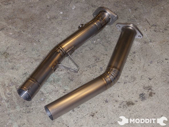 Install the 2 bolt gasket that goes in between front pipe and overpipe.