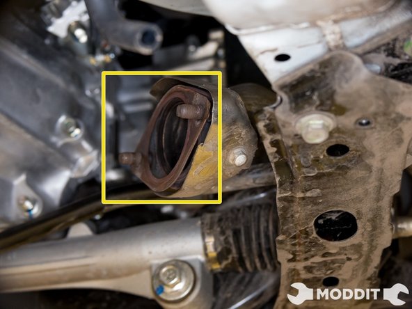 Remove the nuts securing the overpipe to the header. A 14mm gear wrench is suggested.