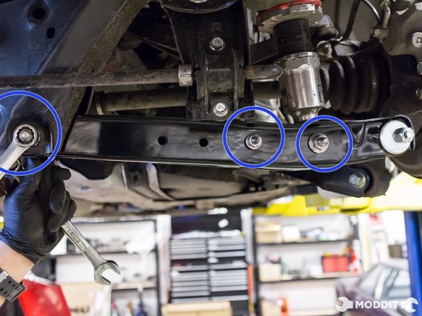 Reinsert the remaining hardware, securing end link and the lower suspension.