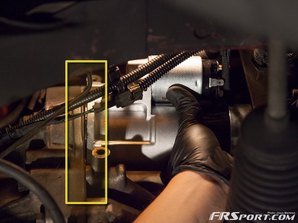 There is a little ridge that has to connect in order for the two bolts you removed to connect or thread properly. Wiggle it if you must until you feel it is connected right.