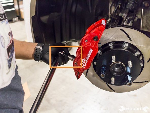 Torque calipers to caliper bracket to specifications.