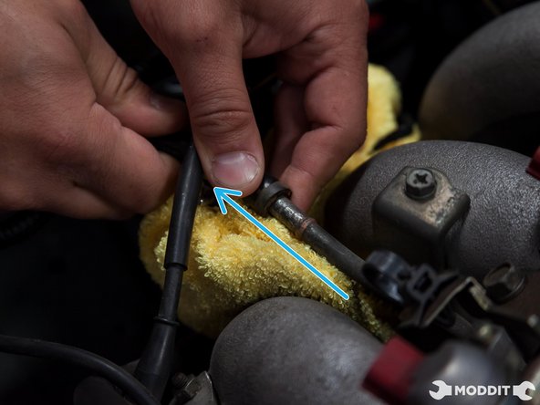 Then remove the fuel feed line and plug it so it doesnt spill. Note: Have a rag handy so the fuel does not spill all over the place.