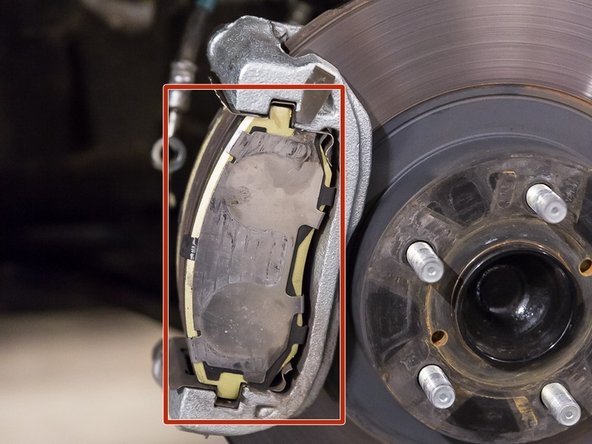 Be cautious to not let the brake pads fall when removing the caliper.