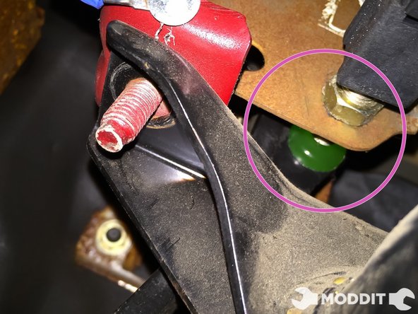 Once installed this is how that same area should look like. When un-pressed the stopper should be pressing on the sensor and thus shutting off your tail lights.