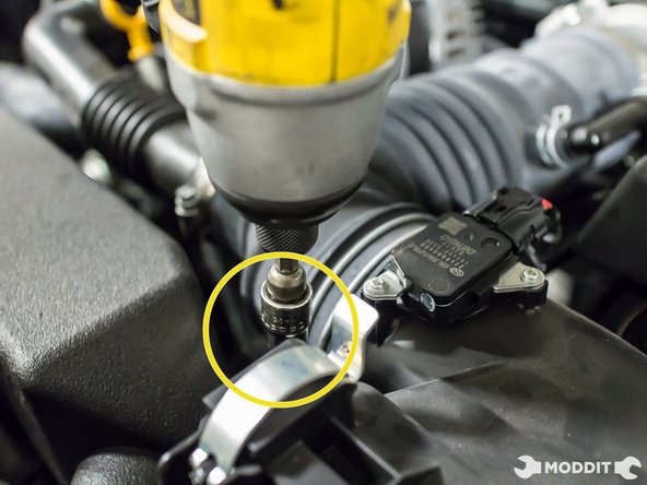 Slowly but surely remove the intake tube from the box.