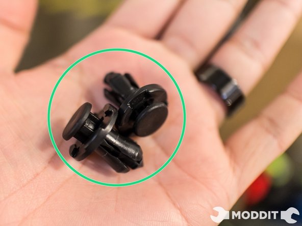 After this there are a couple of beefty clips to remove. Go ahead and take those off as well.