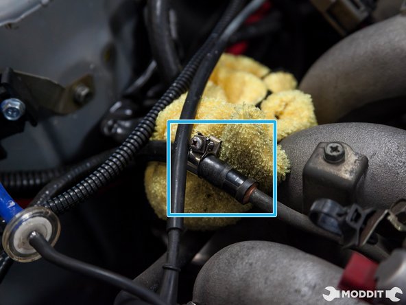 Then remove the fuel feed line and plug it so it doesnt spill. Note: Have a rag handy so the fuel does not spill all over the place.