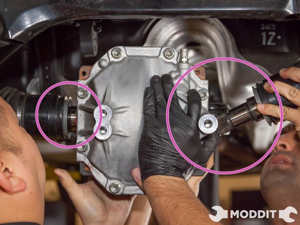 Re-installation is pretty straight forward and resembles the removal closely. You want to insert the driver's side axles into the pumpkin first and then follow by inserting the passenger's side next.