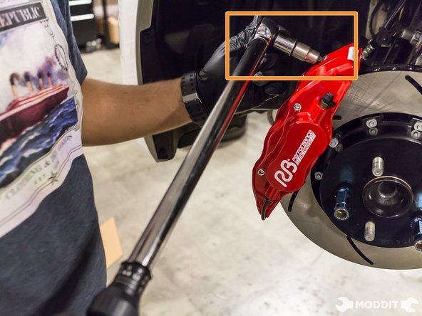 Torque calipers to caliper bracket to specifications.