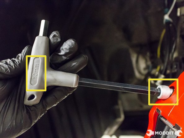 With caliper bleeders facing upwards, install calipers and tighten with 10 mm allen key tool.