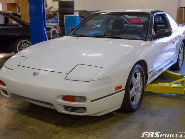 Image 1: Jack up the car, or in this case use a lift.