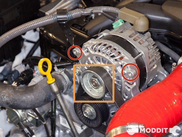 Once removed, use a 24mm socket and impact gun to now remove the loosen the alternator pulley bolt.