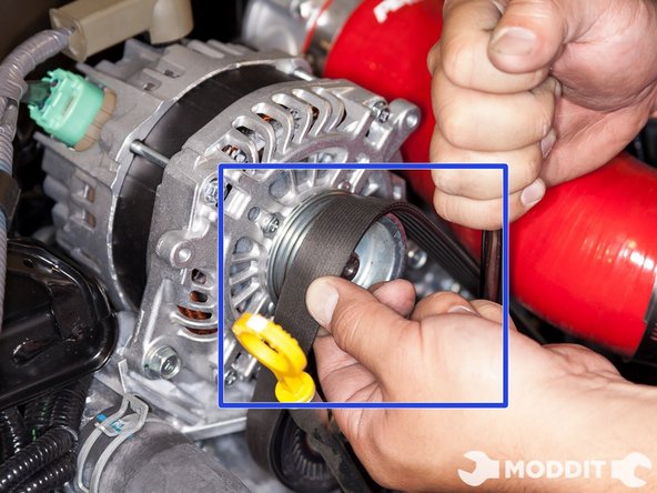 Once the pulley's are loose, and all the bolts are loose, you can go ahead and slip the belt off of the pulleys.