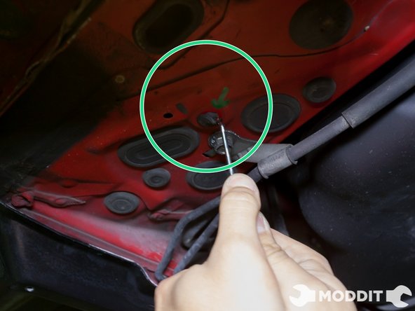 You will discover that this side has some clips hidden by the factory dampening material as well. Using the same sharp 45 degree pick as before (or any pick for that matter) pry the clips from the insulating material and remove.