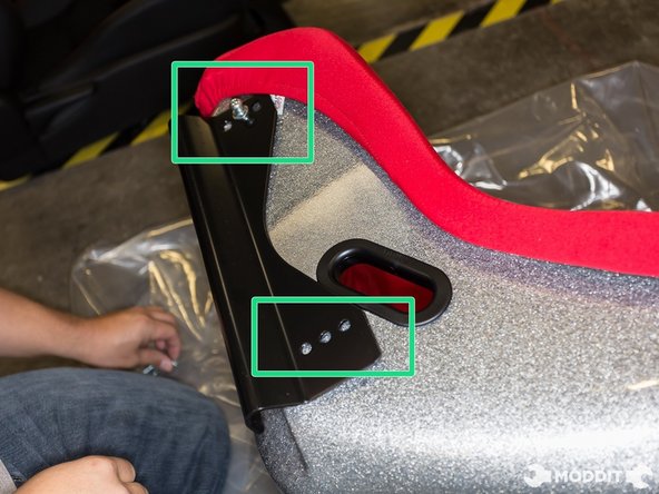 After bolting on the seat belt buckle, you can now move on to the seat.