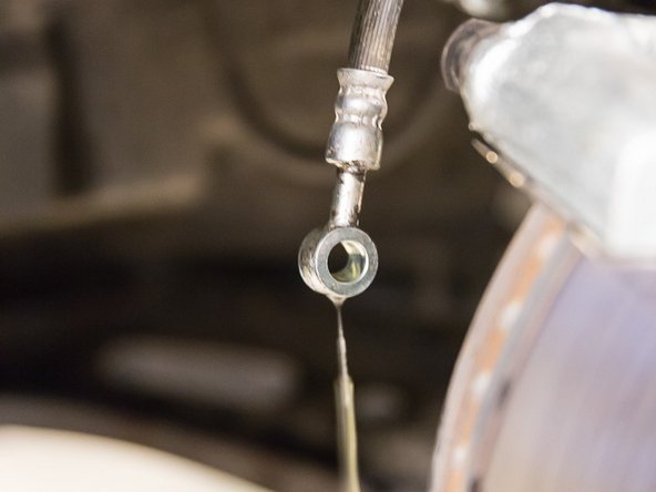 Warning: Brake fluid will begin to leak.