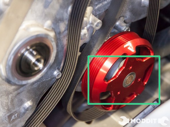 Set the water pump pulley on the water pump and make sure the orientation is correct.