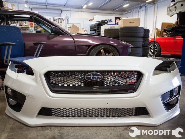 After making sure all the tabs are clicked in and the screws are tight, go ahead and proceed to the installation of the bumper.