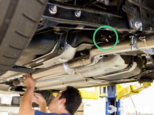 After getting the midpipe on the hanger, lightly bolt the midpipe to the front pipe. Do not tighten as you will need to move it around for the last few steps.