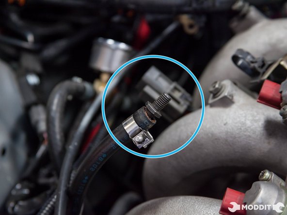 Then remove the fuel feed line and plug it so it doesnt spill. Note: Have a rag handy so the fuel does not spill all over the place.