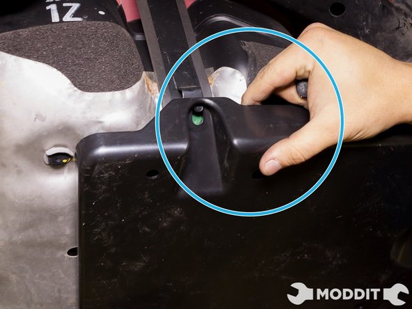 Using the similar mounting points found on the smaller stock unit you you can align the right/under panel to where it belongs