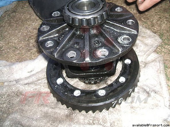 You'll want a spare set of hands to hold down the open differential.