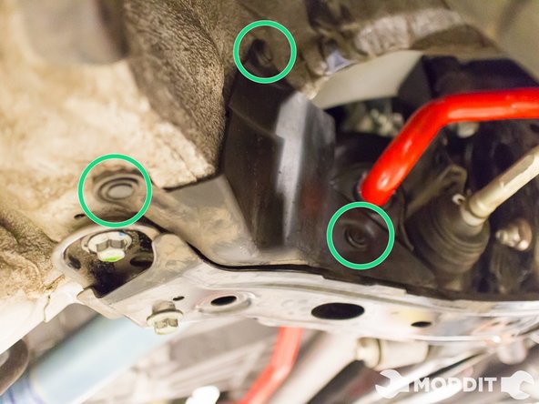 After the sway bar brace is buttoned up, go ahead and reattach the splash shield on both sides