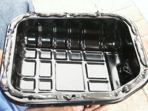 Clean the new pan and use ATV gasket maker (RTV Silicone) in a thick bead around the seam of the pan.