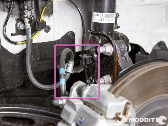 Removal/Installation of the Front Suspension: Once you have the front wheels removed, there are a few things that you need move out of the way before removing the entire front shock/strut assembly.