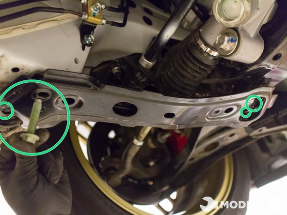 There should be bolts visible at both the ends of this bracket.