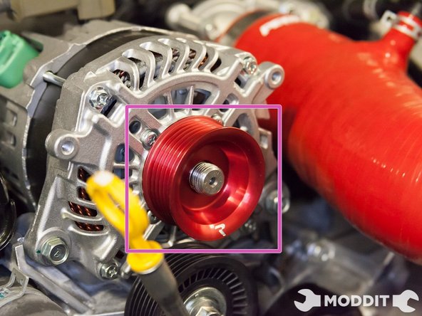 Now install the alternator pulley but do not thread the nut on yet.