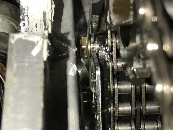 If you tensioner does not compress, you may need to remove the front cover and the tensioner. Once removed, the tensioner can be slowly compressed in a vice with the proper soft jaw to not damage the guide surface.