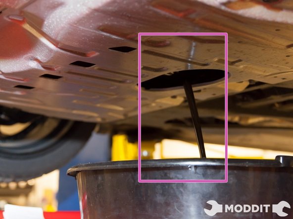 start unscrewing the bolt and begin the process of leaking out the oil.
