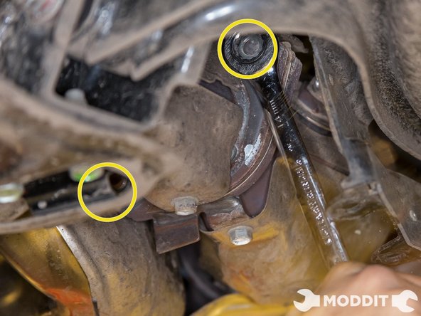 Remove the nuts securing the overpipe to the header. A 14mm gear wrench is suggested.