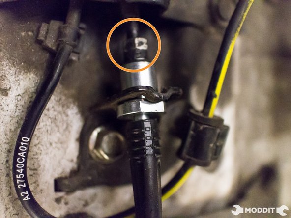 With stainless steel line secured, finish tightening 10 mm hard line.