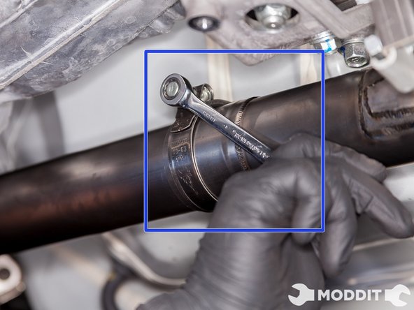 Tighten 10mm t-bolt clamp on the front pipe.