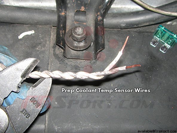 The coolant temp sensor is located on the upper intake manifold near the upper radiator hose inlet.