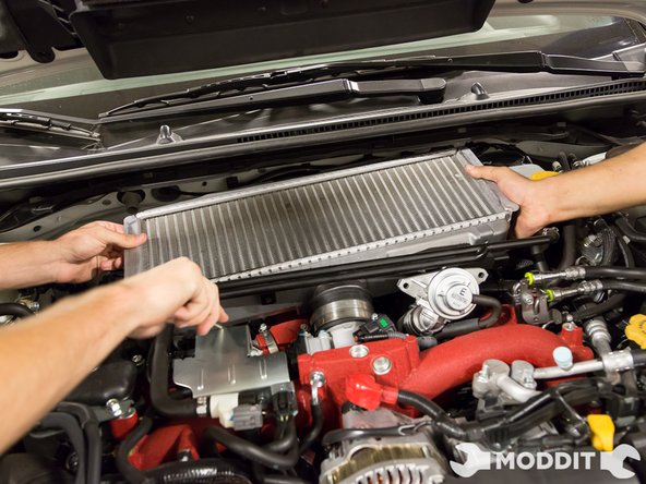 Carefully remove the intercooler some wiggling will be required