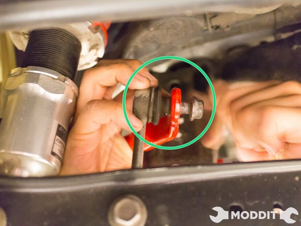 Secure but do not tighten the Tanabe sway bar to the end links. This will help keep the bar in place while you go prep the bushings.