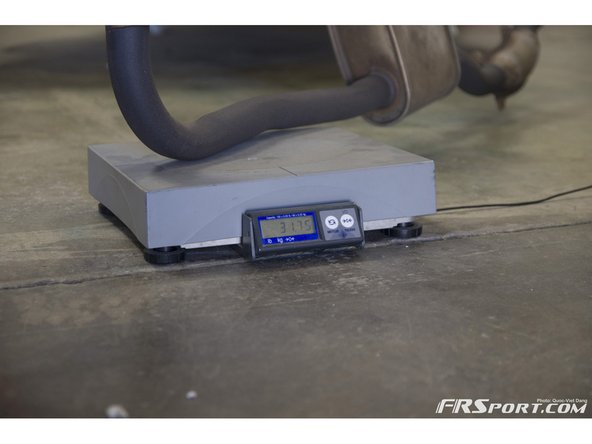The stock exhaust weighed in at just under 32 lbs.