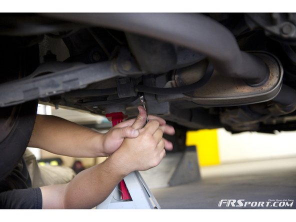 Disconnect the exhaust from the catalytic converter.