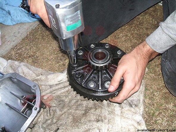 Step 7 Remove the ring gear from the open differential by unbolting the bolts with an impact gun.