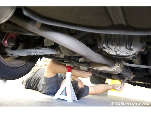 Once the car is on jack stands, find someone (or use your jack) to lightly support the exhaust.