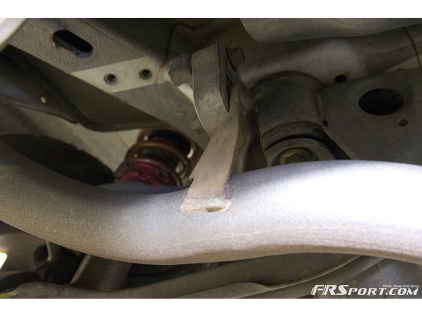 Keep your exhaust supported on the inside muffler side at this point. Locate the remaining hangers &amp; remove them.