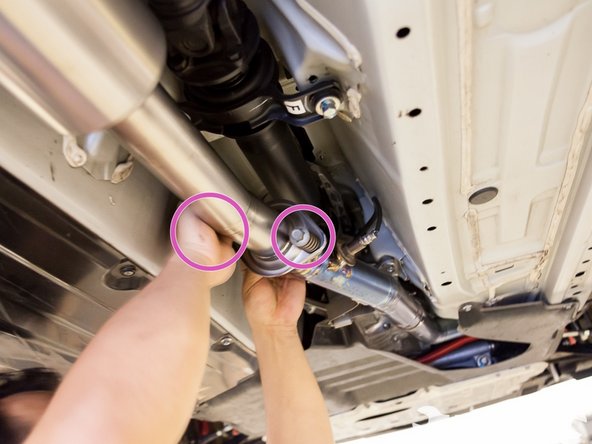 After getting the midpipe on the hanger, lightly bolt the midpipe to the front pipe. Do not tighten as you will need to move it around for the last few steps.