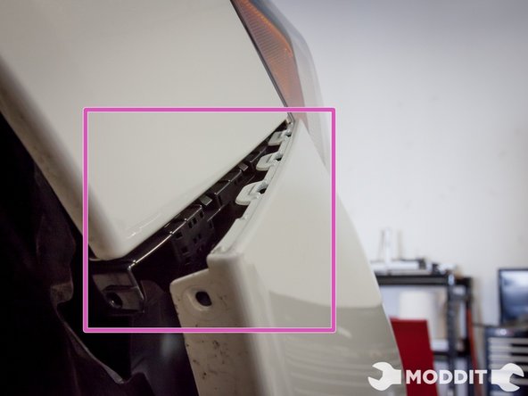 After the 6 bolts are removed, it is time to slightly tug on the bumper.