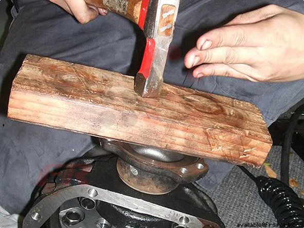 Step 13 Hammer in the axle shaft with a piece of wood in between, accordingly to which side it came from.